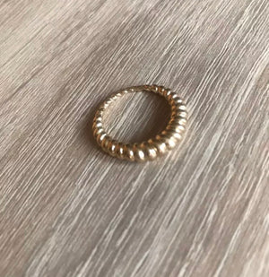 Twisted Tidal Ring